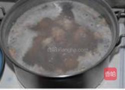 花蛤鱼头粥的做法图解3